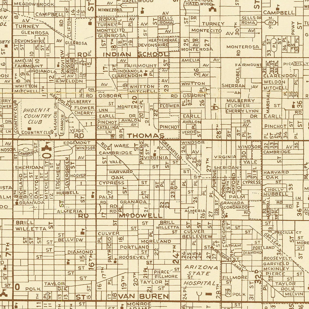 A framed vintage map displayed in a warm and thoughtfully designed interior